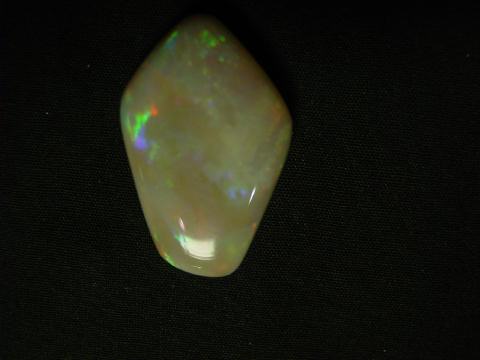 A bright white Mintabie Opal destined to be a fish pendant.